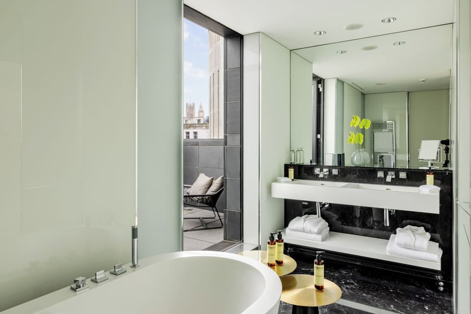 Designer toiletries, hair dryer, bathrobes, slippers