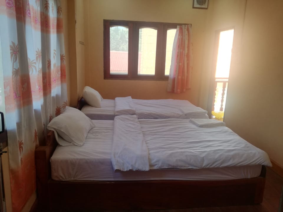 Twin Room with Fan | Iron/ironing board, free WiFi, bed sheets