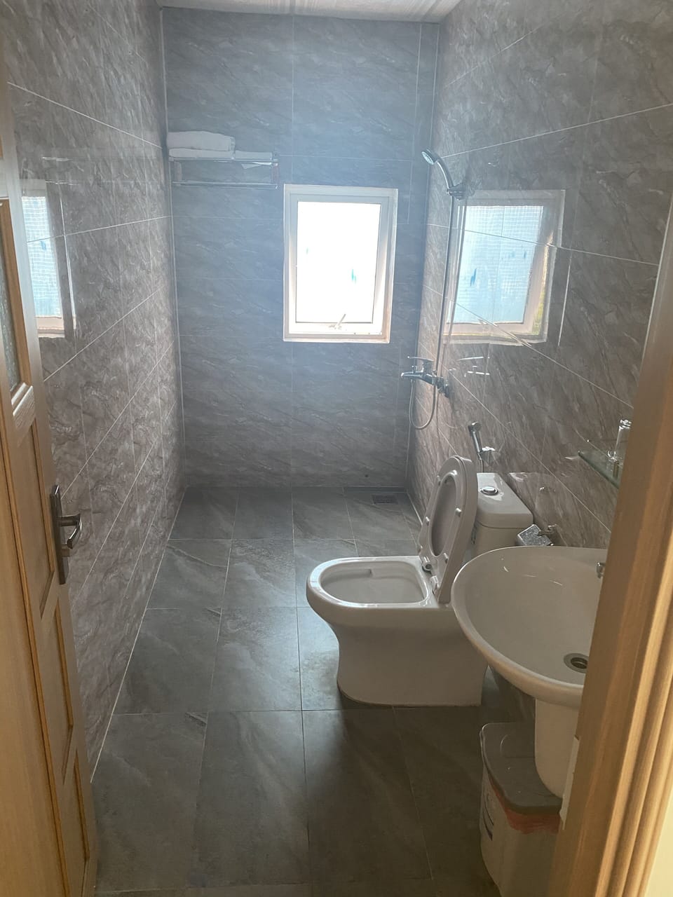 Quadruple Room | Bathroom | Shower, free toiletries, hair dryer, slippers