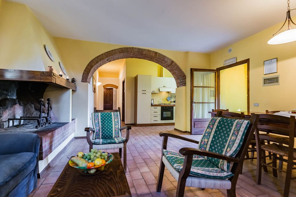 Comfort Apartment | Living area | 21-inch TV with digital channels, fireplace