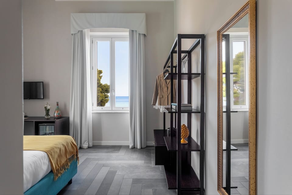 Deluxe Room | Premium bedding, minibar, in-room safe, desk