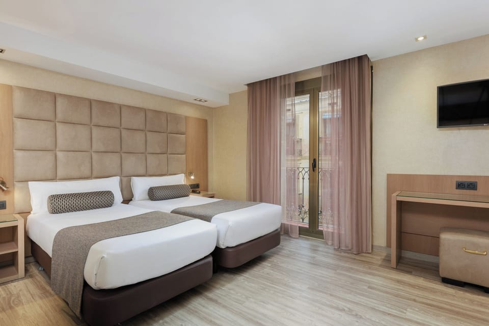 Quadruple Room | Down comforters, in-room safe, desk, soundproofing