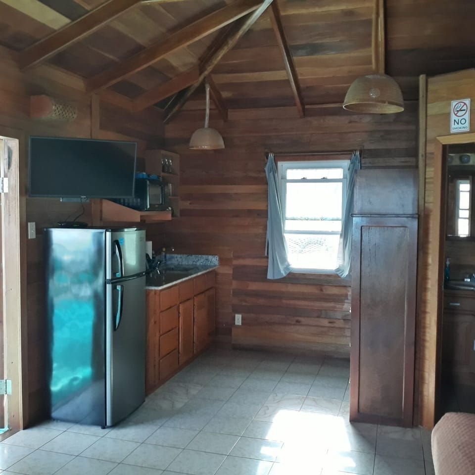 Cabin, Kitchenette, Sea View | Private kitchenette | Full-size fridge, microwave, toaster oven, cookware/dishes/utensils