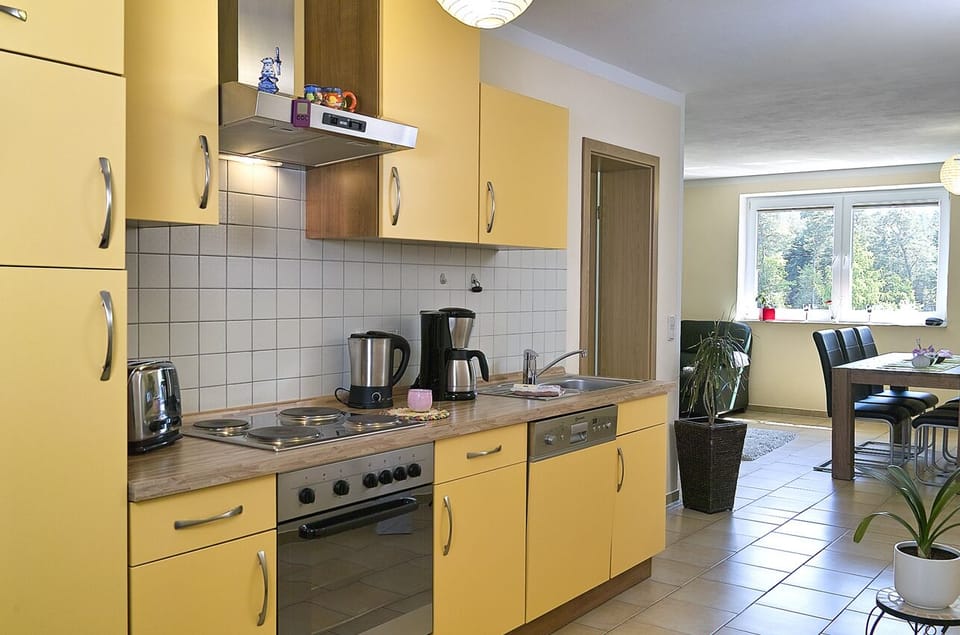 Coffee/tea maker, fridge, stovetop, dishwasher