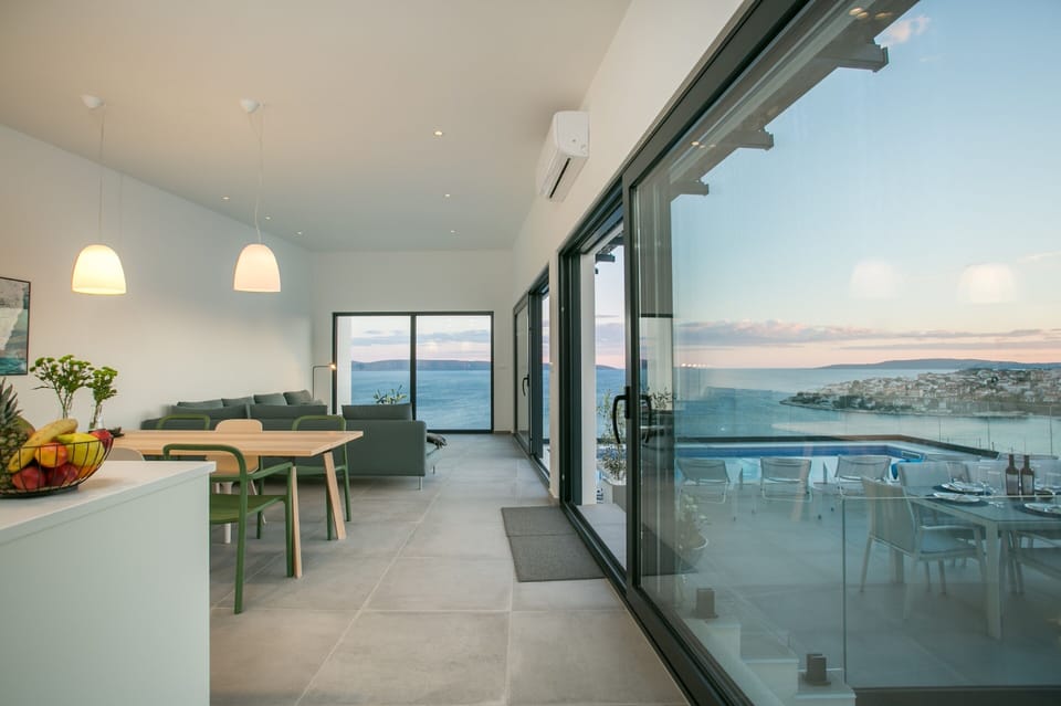 Villa, Private Pool | Living area | 32-inch flat-screen TV with satellite channels, TV, books