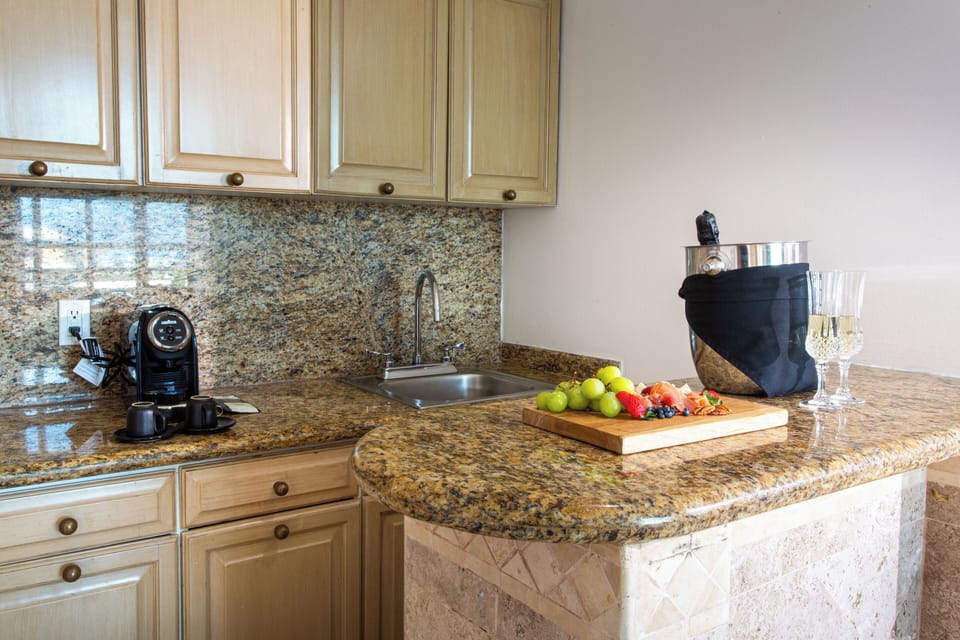 Sandos Suite | Private kitchen | Espresso maker, dining tables