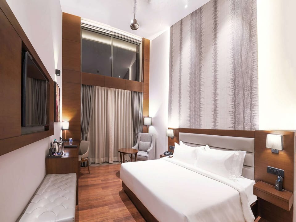 Egyptian cotton sheets, premium bedding, minibar, in-room safe