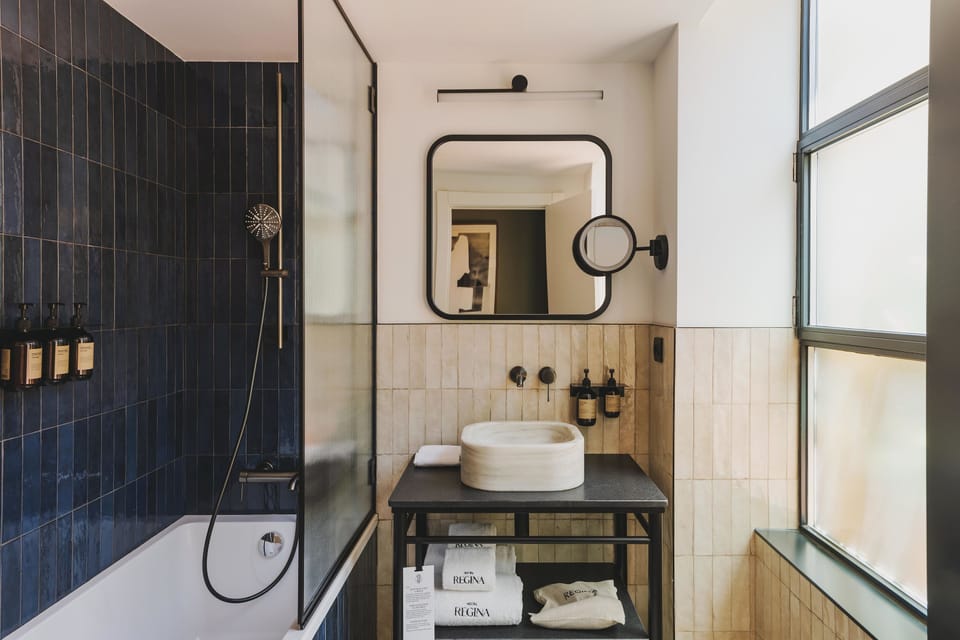 Shower, rainfall showerhead, free toiletries, hair dryer