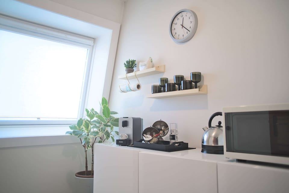 Suite, 1 Queen Bed | Private kitchenette | Eco-friendly cleaning products, reusable coffee/tea filters