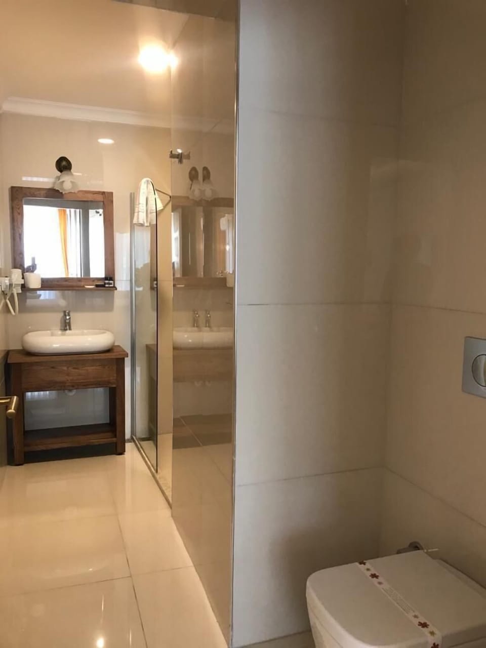 Rainfall showerhead, hair dryer, slippers, towels