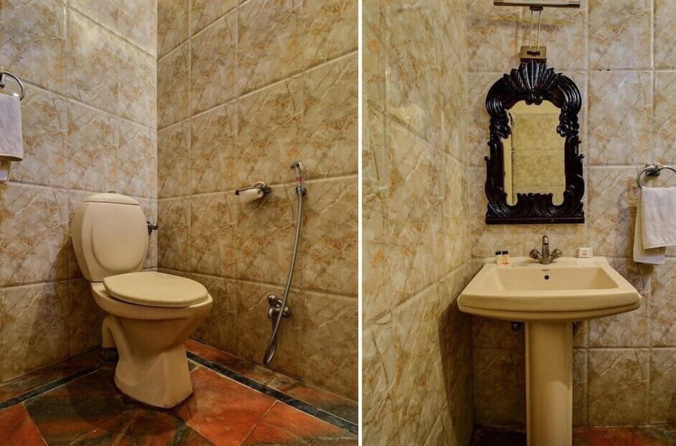 Deluxe Room | Bathroom | Shower, towels