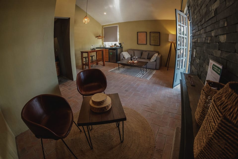 Villa | Living area | 30-inch TV with digital channels