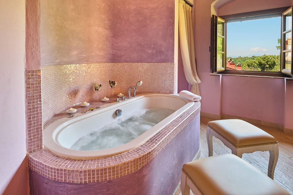Suite, Jetted Tub | Minibar, in-room safe, laptop workspace, soundproofing