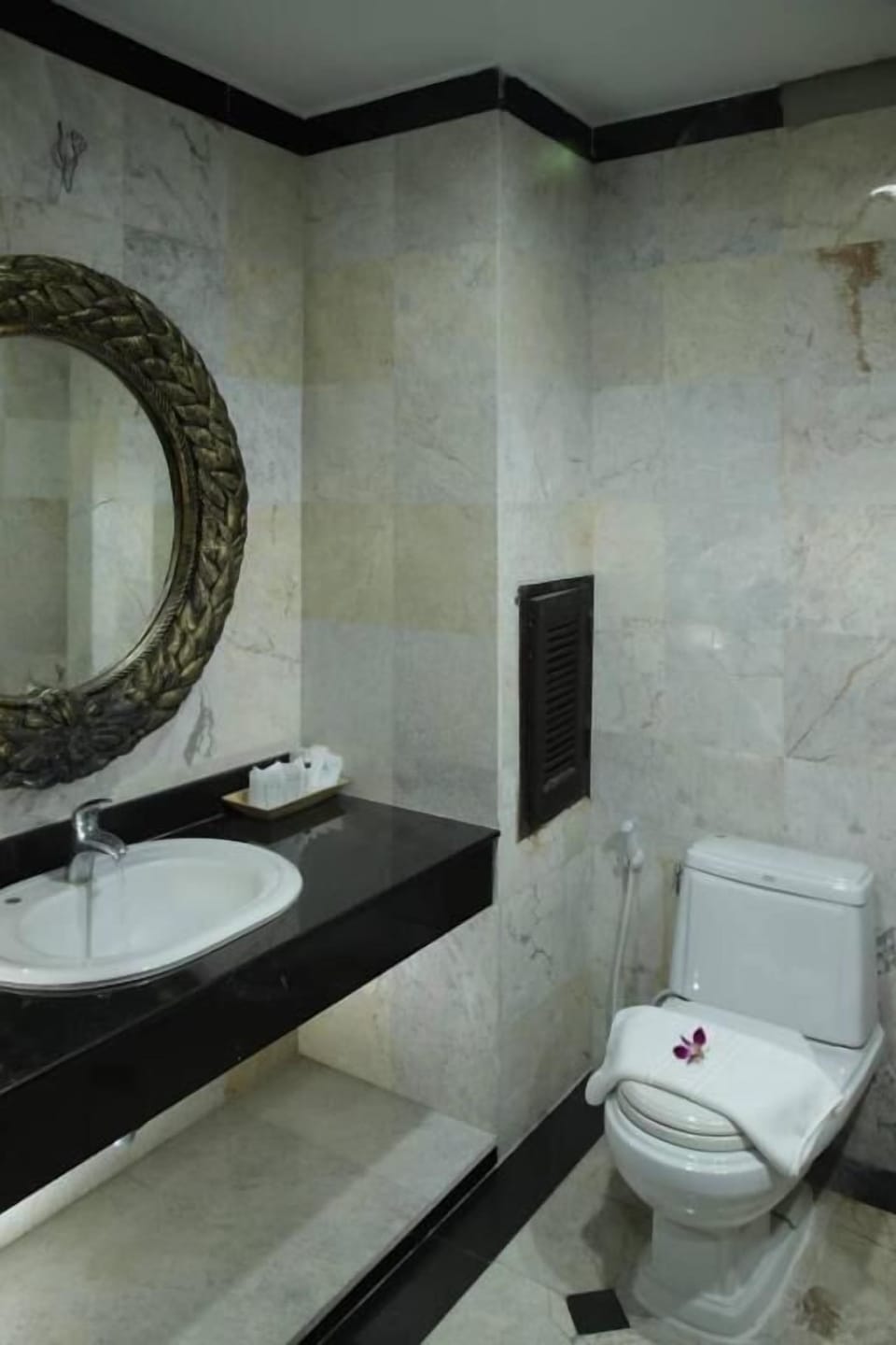 Shower, free toiletries, slippers, towels