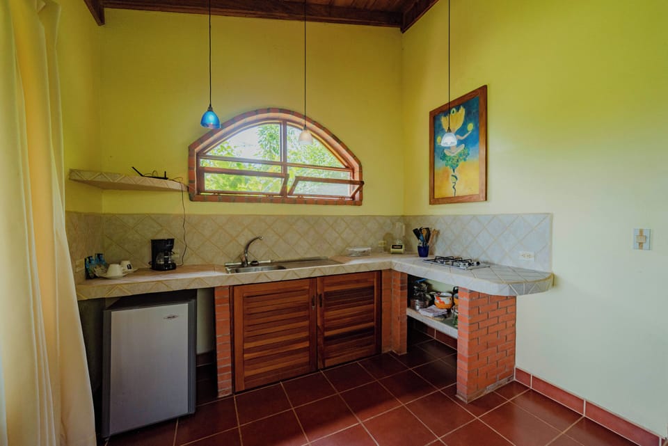 Suite, 1 Queen Bed with Sofa bed | Private kitchenette | Mini-fridge, coffee/tea maker