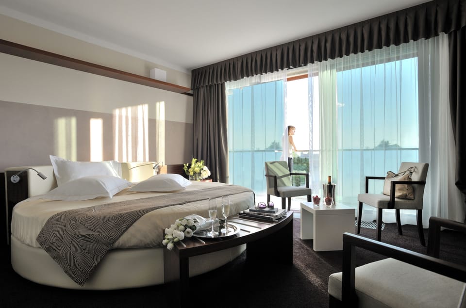 Suite (Round) | Premium bedding, minibar, in-room safe, desk