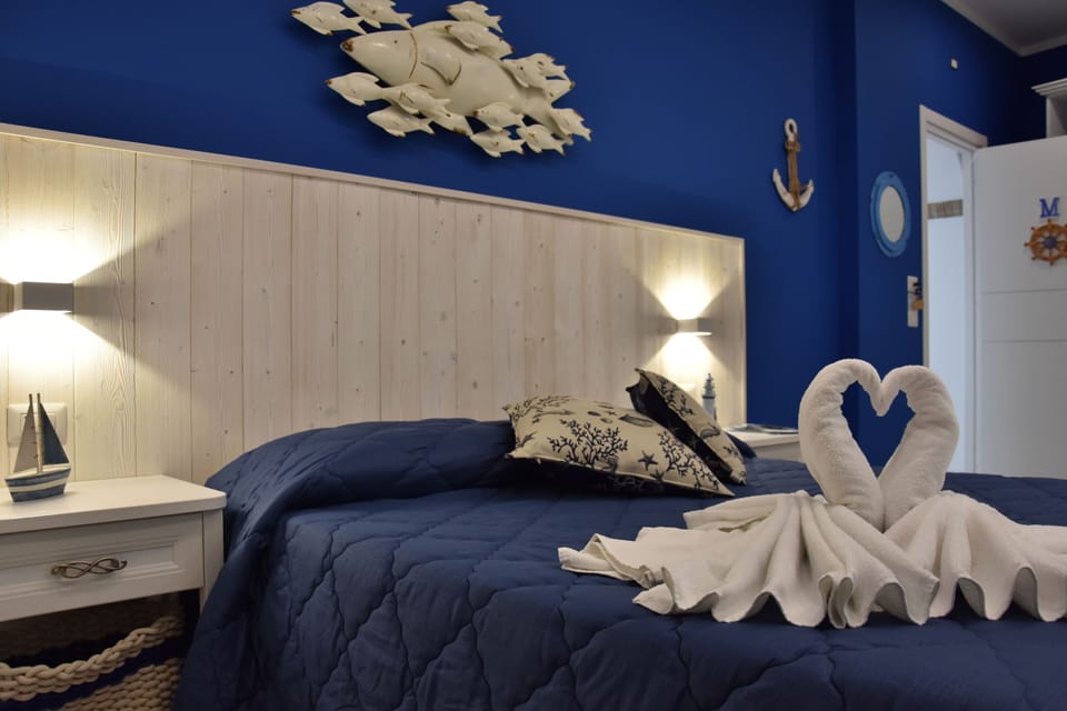 Triple Room, Private Bathroom | In-room safe, desk, free WiFi