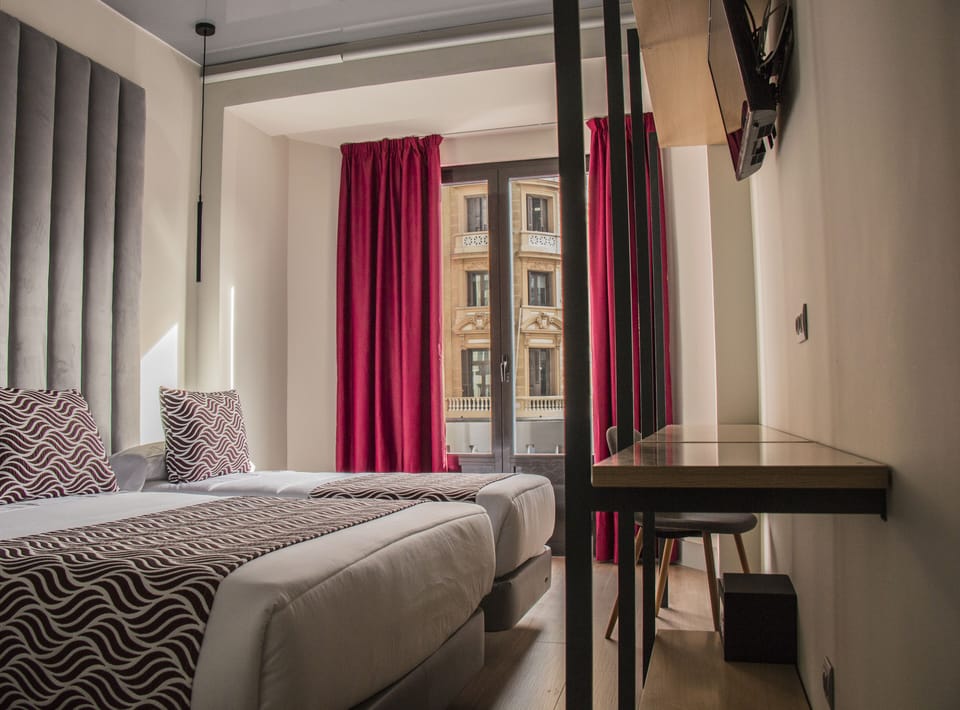 Basic Triple Room, Private Bathroom, City View (TmV) | In-room safe, desk, blackout drapes, soundproofing