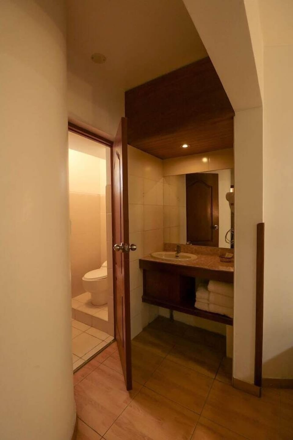 Shower, designer toiletries, towels