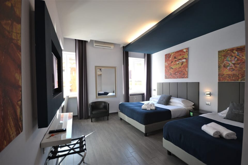 Premium bedding, down comforters, minibar, in-room safe