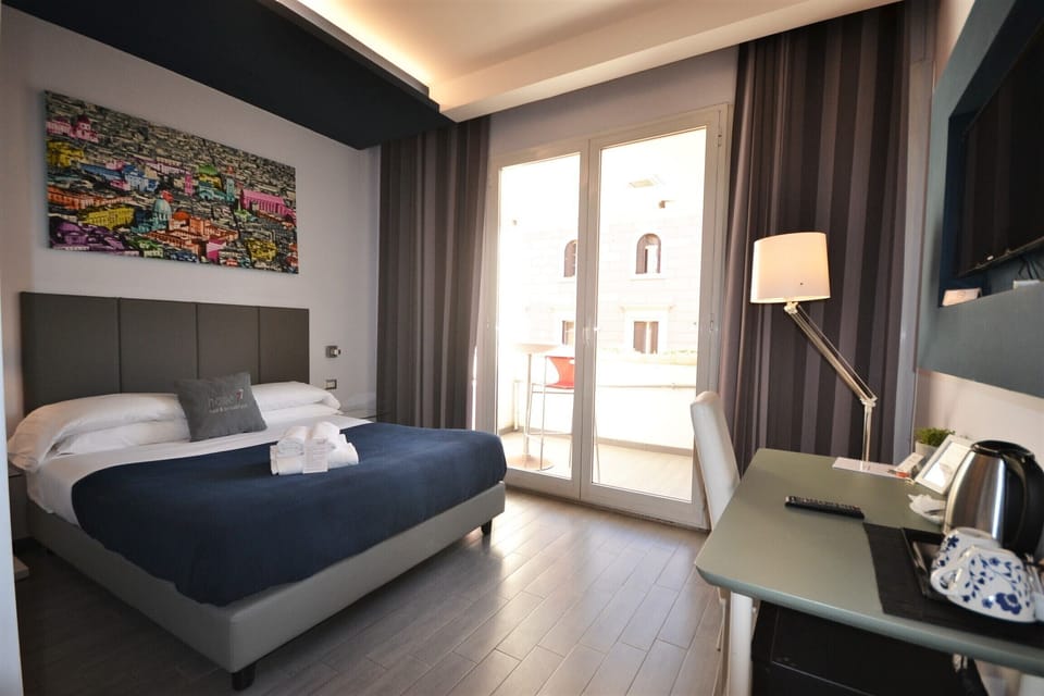 Premium bedding, down comforters, minibar, in-room safe