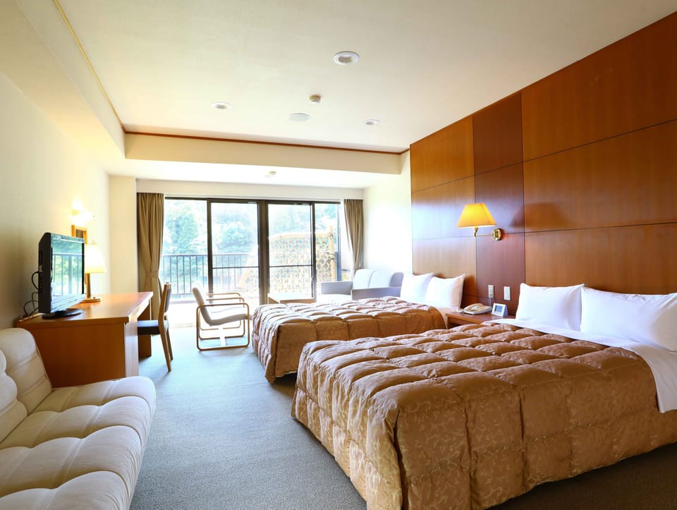 Standard Twin Room with Sofa, Non Smoking | In-room safe, laptop workspace, blackout drapes, free WiFi