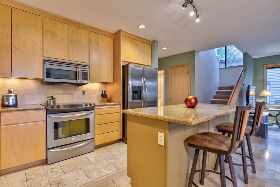 Condo, Multiple Beds (Eaglewood - Unit 8) | Private kitchen | Toaster, dining tables