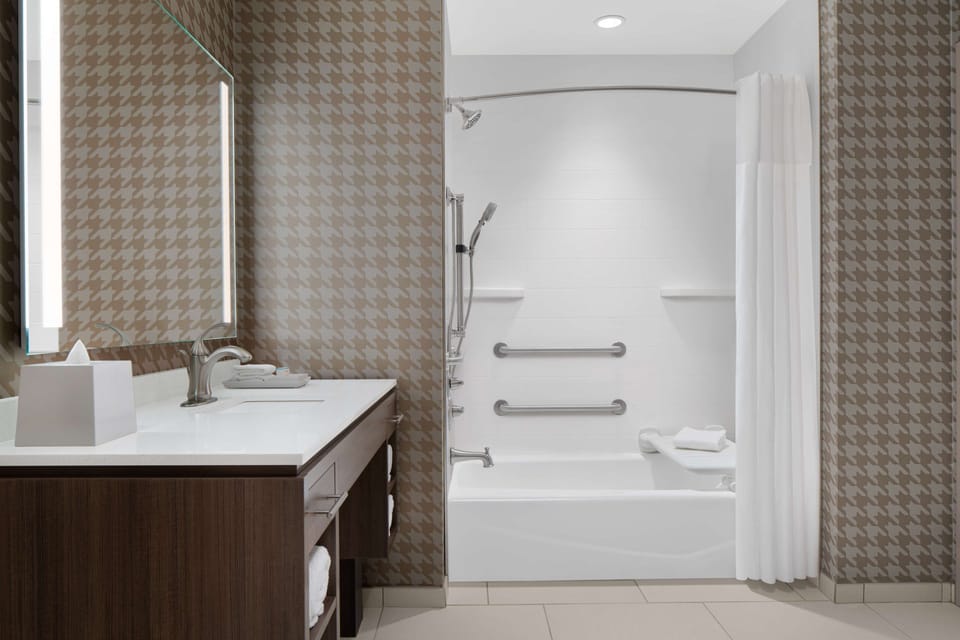 Hair dryer, towels, soap, shampoo