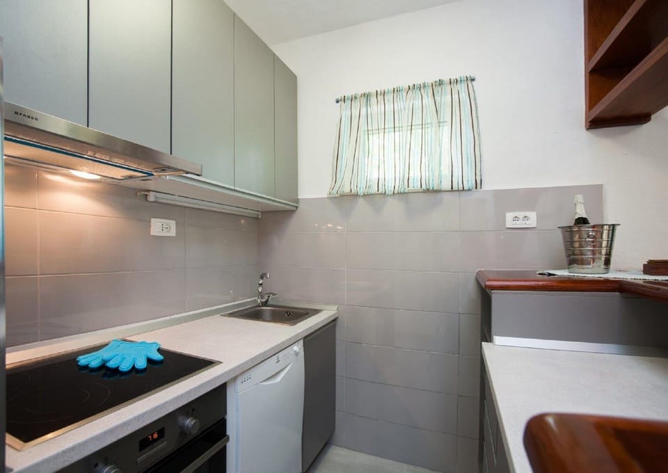 House (Four Bedroom Holiday Home with Pool) | Private kitchen | Fridge, oven, electric kettle, freezer