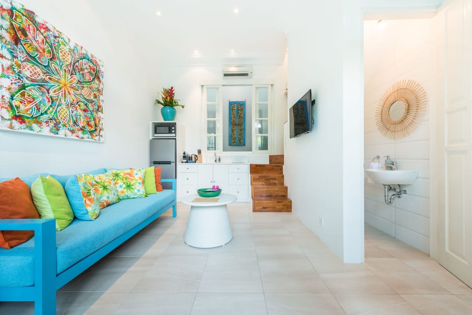 Honeymoon Villa, 1 Bedroom | Living area | 40-inch flat-screen TV with cable channels, LCD TV