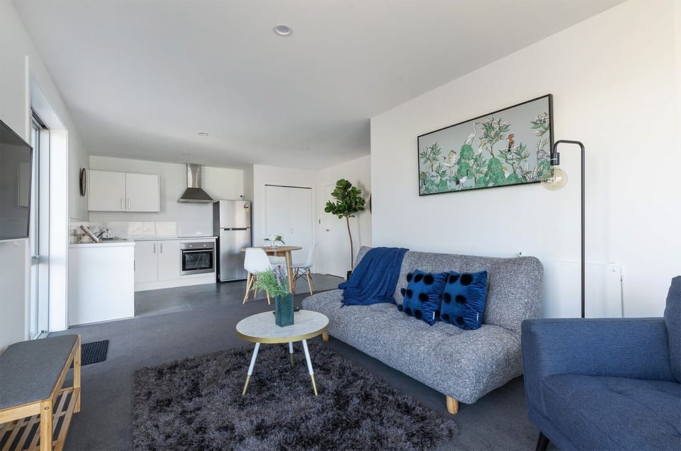 Deluxe Apartment, 1 Bedroom | Living area | Flat-screen TV
