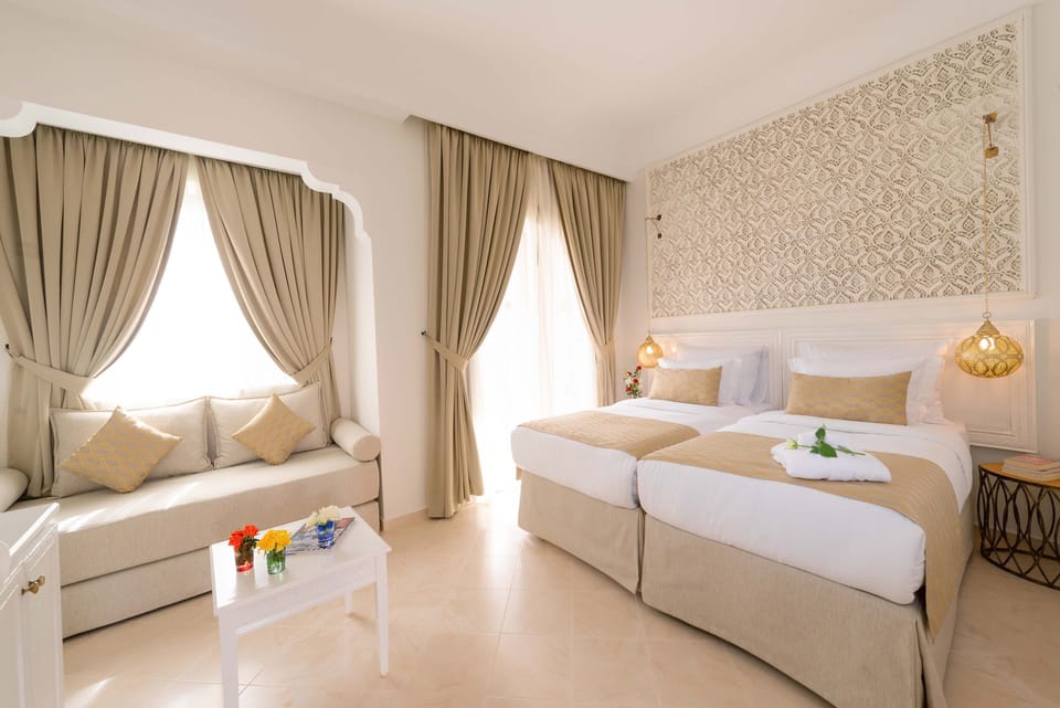 Premium bedding, minibar, in-room safe, laptop workspace