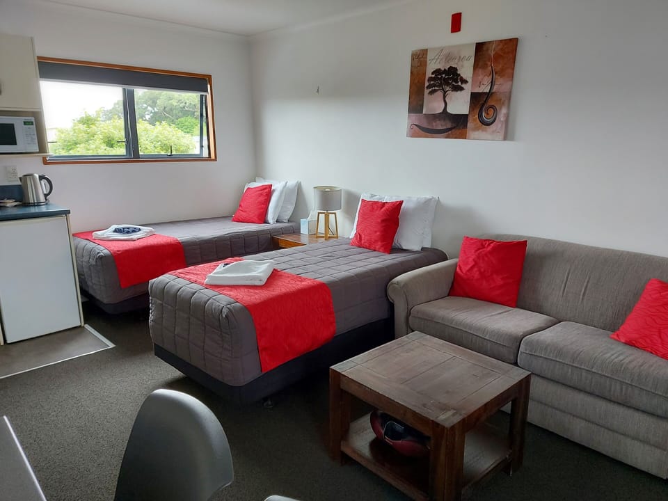 Family Quadruple Room | Living area | Smart TV, DVD player