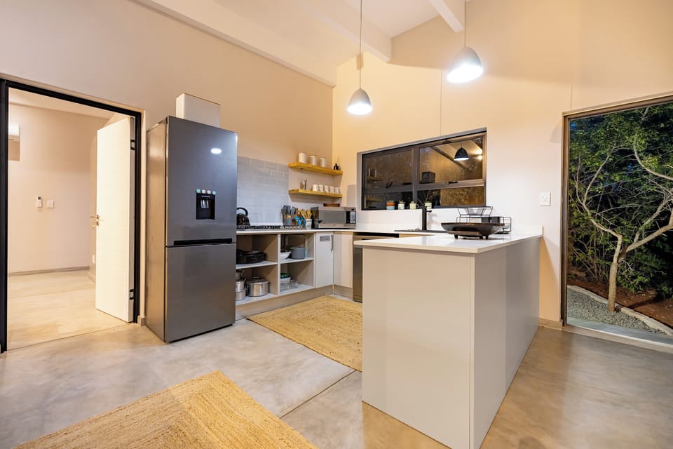 Superior Villa, 2 Bedrooms | Private kitchen | Fridge, electric kettle, dining table