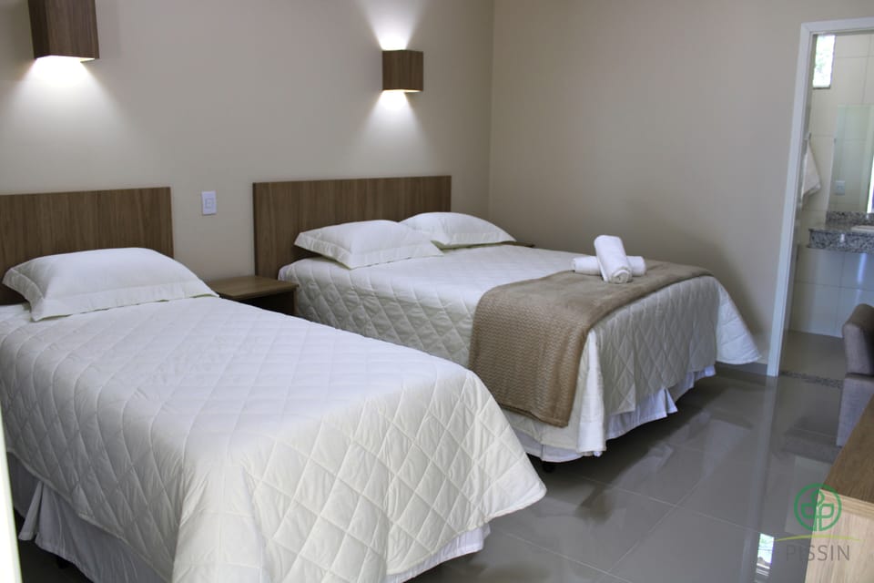 Standard Triple Room | Minibar, desk, iron/ironing board, free WiFi
