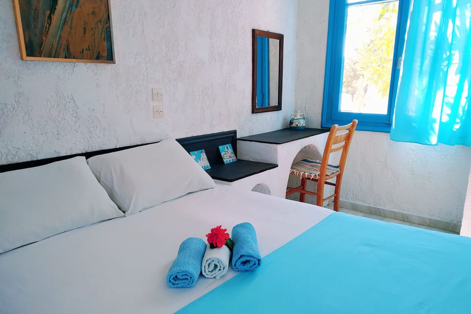 Family Apartment, 2 Bedrooms, Kitchenette, Garden View | Individually decorated, individually furnished, desk, laptop workspace