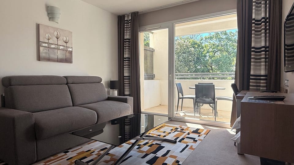 Family Suite, Terrace | Living area | 82-cm flat-screen TV with satellite channels, TV, table tennis