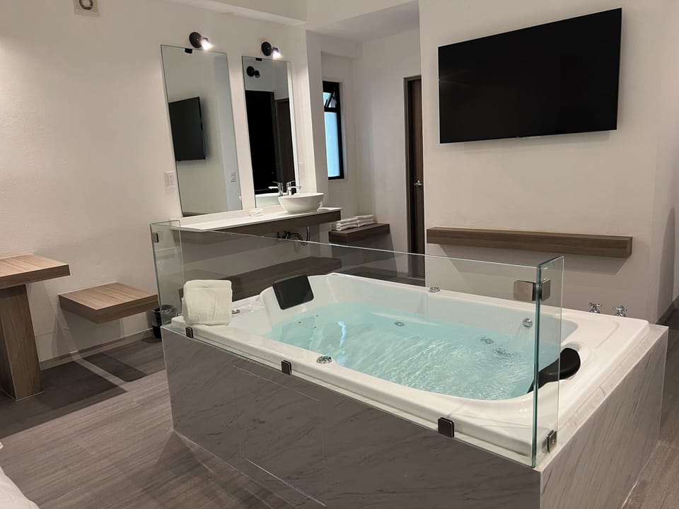 Luxury Room | Down comforters, pillowtop beds, desk, laptop workspace