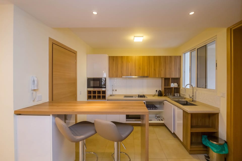 Apartment, 2 Bedrooms | Private kitchen | Fridge, microwave, stovetop