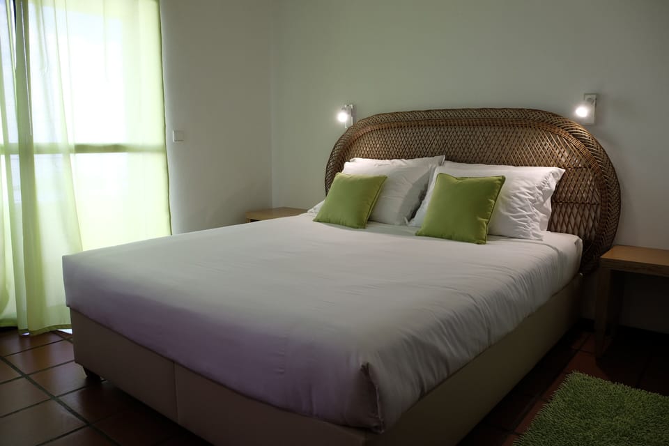 Apartment, 1 Bedroom | Minibar, iron/ironing board, free WiFi, bed sheets