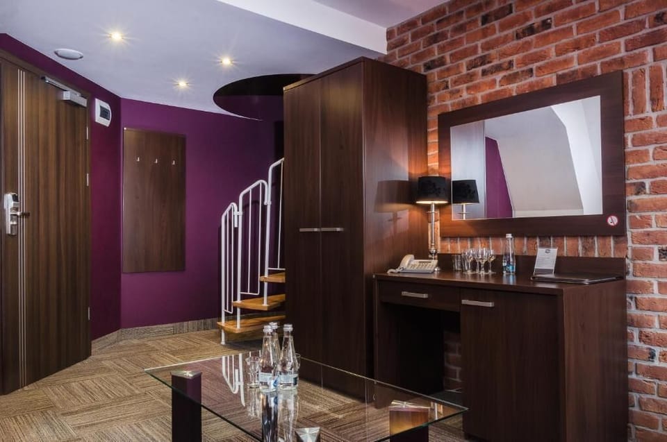 Deluxe Quadruple Room, Non Smoking, City View | Living room | 37-inch LCD TV with satellite channels, TV