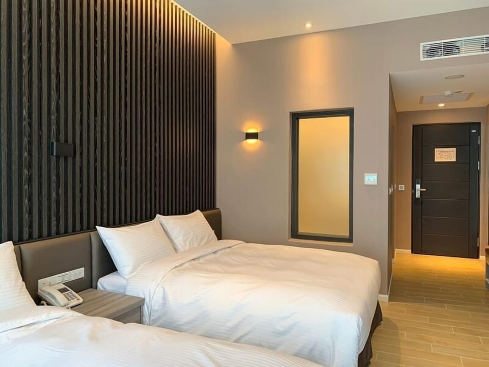 Premium Quadruple Room | Premium bedding, down comforters, in-room safe, desk