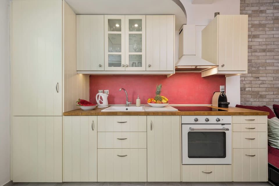 Design Apartment, 1 Bedroom, Garden View, Ground Floor | Private kitchen | Full-size fridge, oven, coffee/tea maker, electric kettle