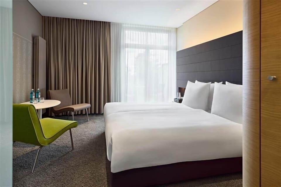 Premium bedding, down comforters, in-room safe, individually furnished