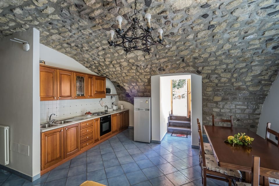 Apartment, 2 Bedrooms, Patio, Sea View | Private kitchen | Full-size fridge, microwave, oven, stovetop
