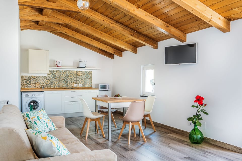 Family Apartment, 2 Bedrooms, 1 Bathroom, Sea View | Living area | 32-inch flat-screen TV with digital channels, TV
