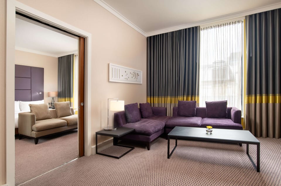 Suite, 1 Bedroom | Down comforters, in-room safe, desk, soundproofing