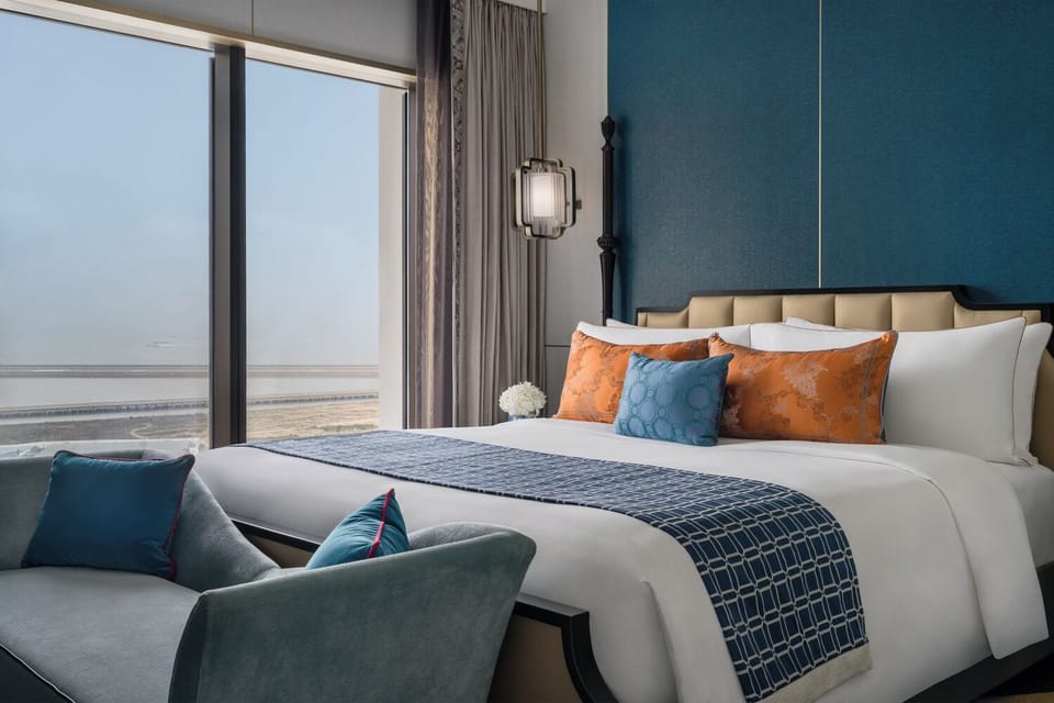 Corner Suite with Suite Privilege | Minibar, in-room safe, desk, laptop workspace