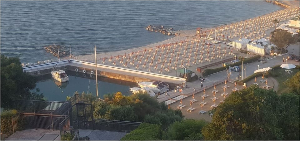 Private beach, sun loungers, beach umbrellas, beach towels