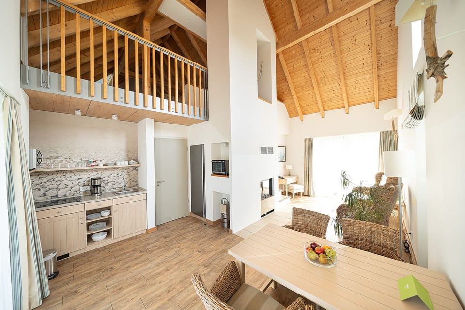 Standard Villa, 1 Bedroom, Lake View | Living area | Flat-screen TV